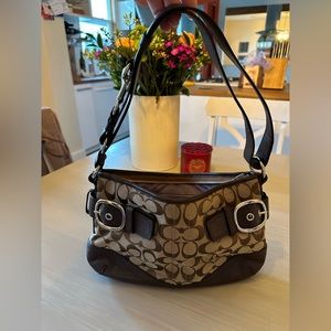 Coach Shoulder bag. Brown/tan with lavender lining